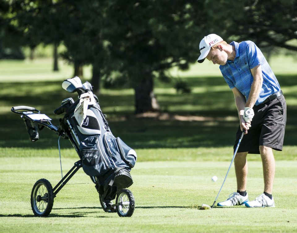 Jeff Atkinson driving off the fairway 